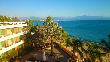 On the beach, sun loungers, beach umbrellas, beach towels
