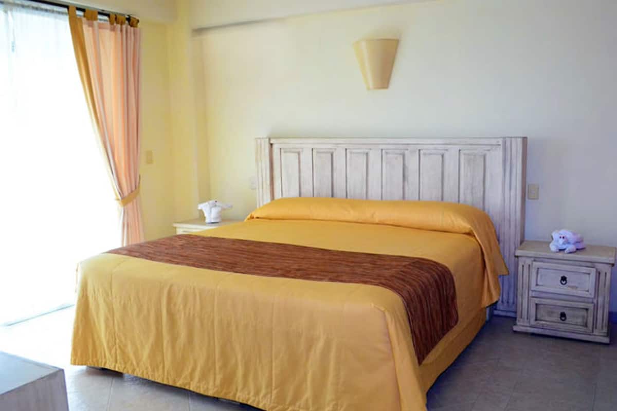 Superior Suite, 1 Bedroom, Kitchenette, Partial Ocean View | In-room safe, iron/ironing board, free WiFi