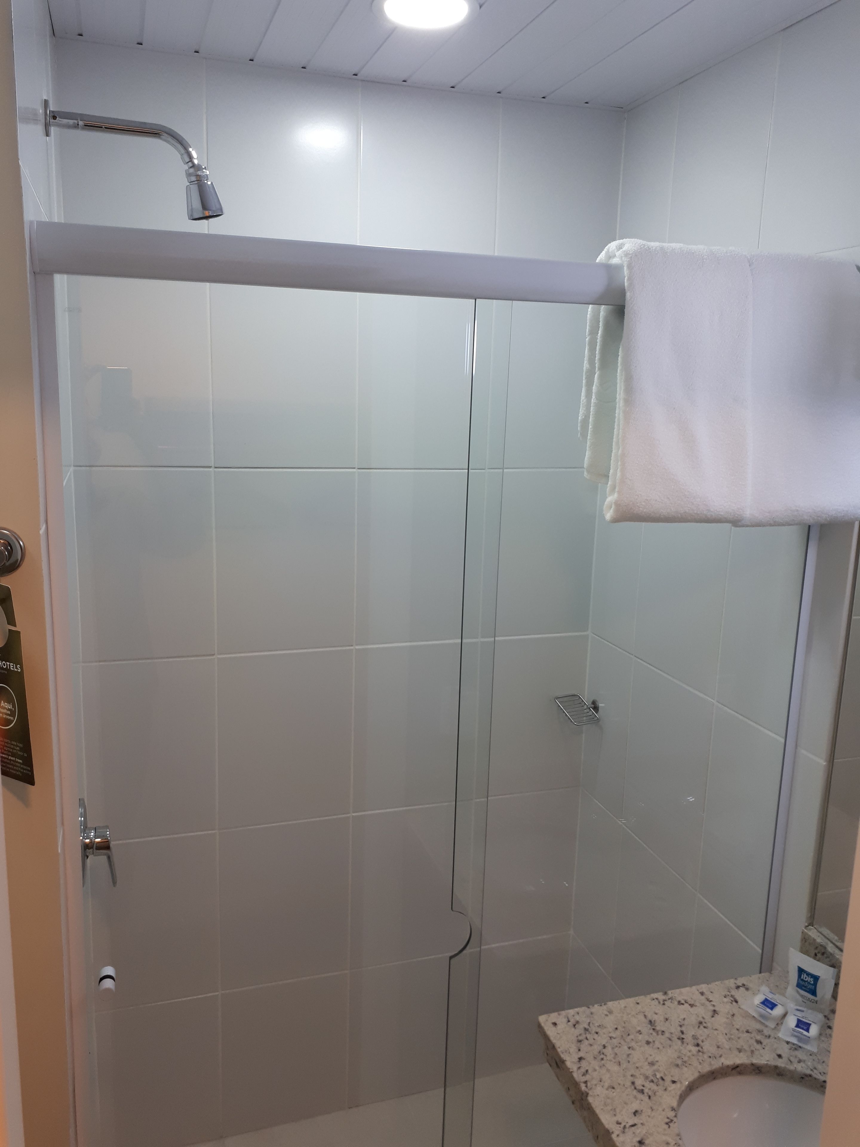 eco-friendly toiletries, hair dryer, towels