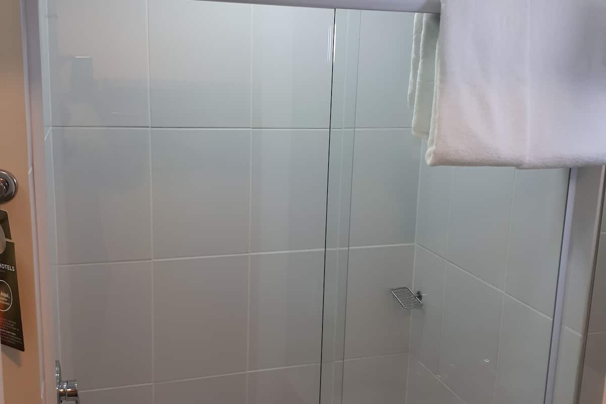 eco-friendly toiletries, hair dryer, towels