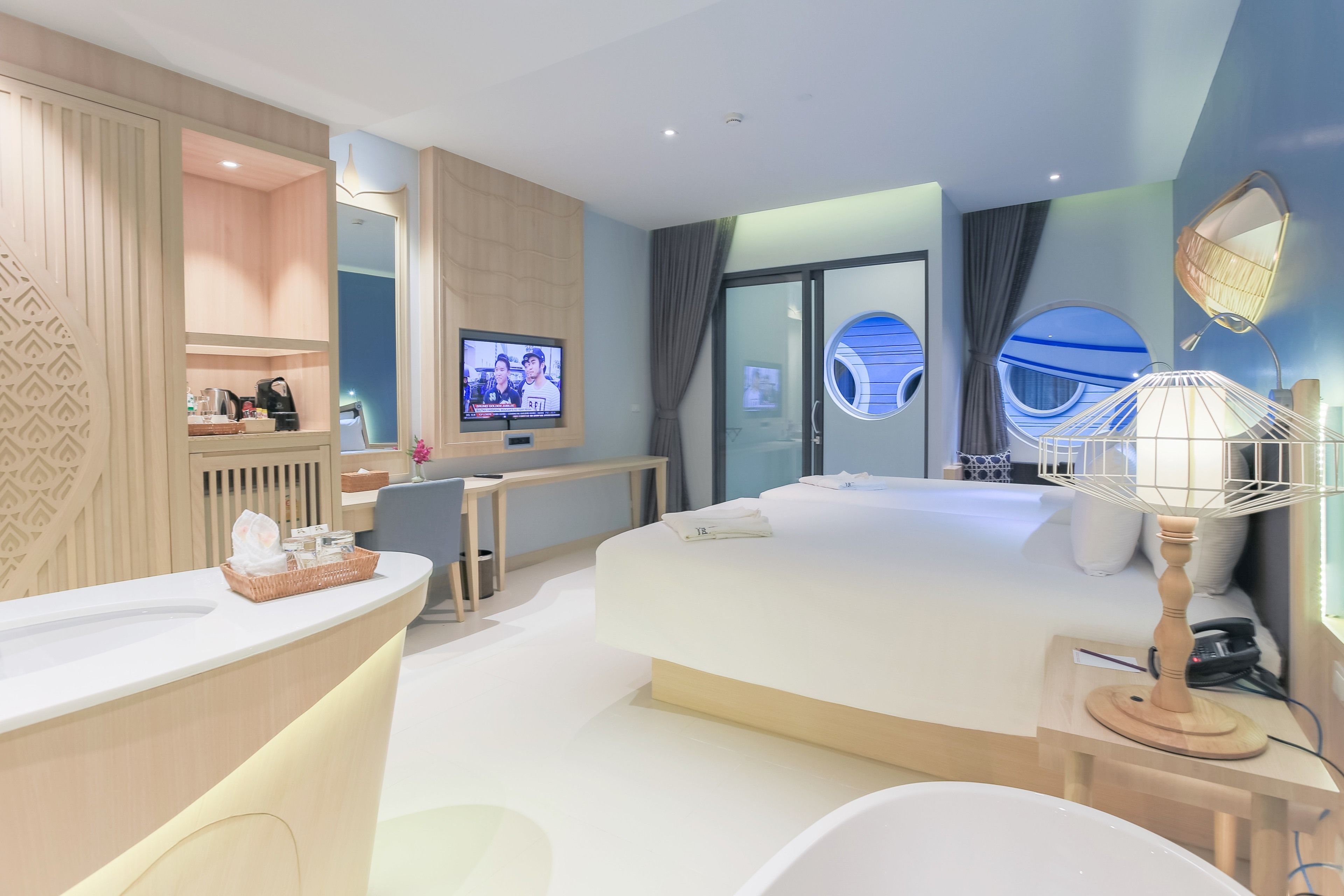 beyond deluxe twin | minibar, desk, blackout curtains, soundproofing