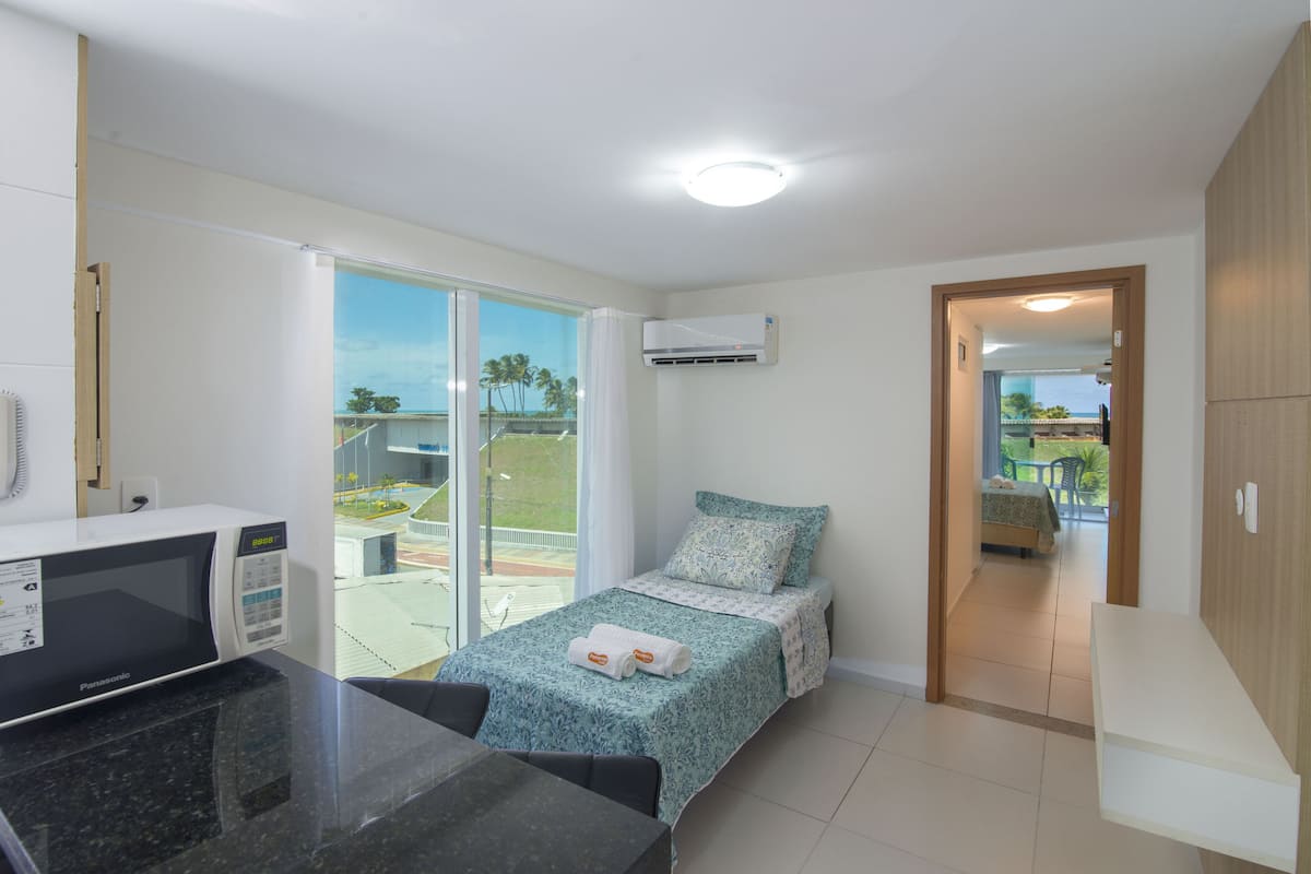 panoramic apartment, 1 bedroom, kitchen, beach view | blackout curtains, soundproofing, iron/ironing board, free wifi
