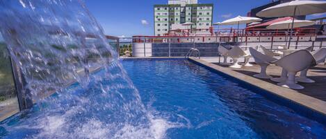 Outdoor pool, open 8:00 AM to 10:00 PM, pool umbrellas, pool loungers