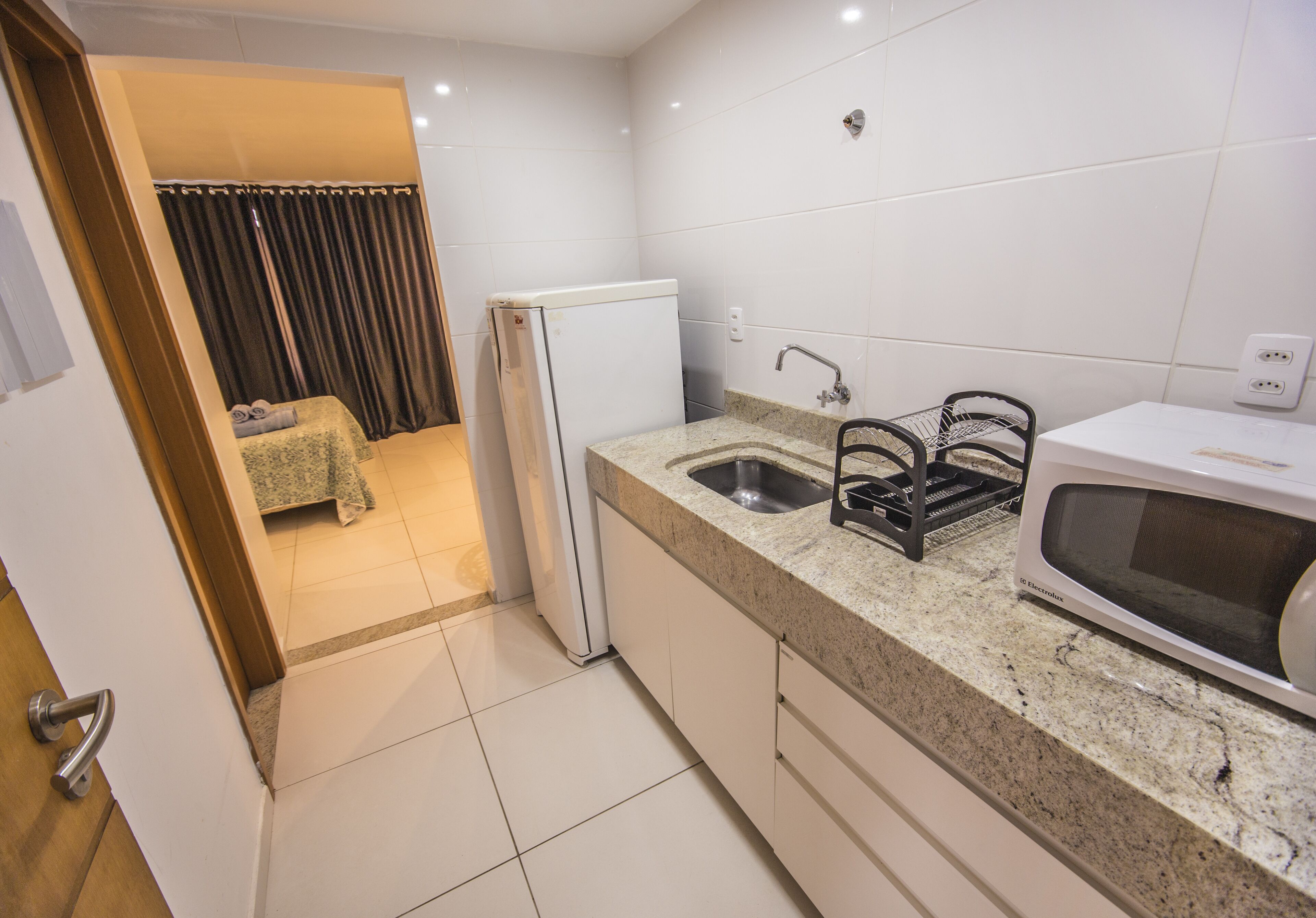 luxury studio suite, 1 bedroom, kitchen, partial sea view | private kitchen