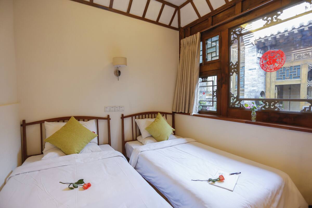 Comfort Twin Room | Premium bedding, desk, blackout curtains, iron/ironing board