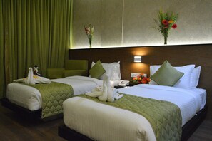 Premium bedding, down comforters, minibar, blackout drapes