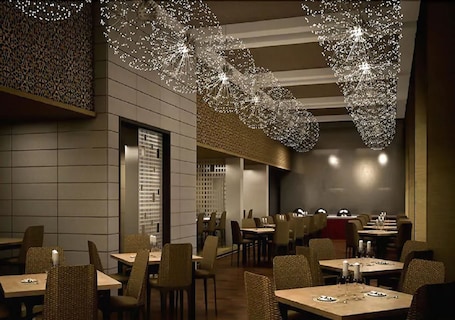 Breakfast, lunch, dinner served; international cuisine