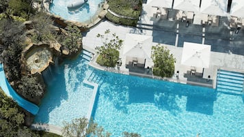Outdoor pool, open 7:00 AM to 10:00 PM, pool umbrellas, sun loungers