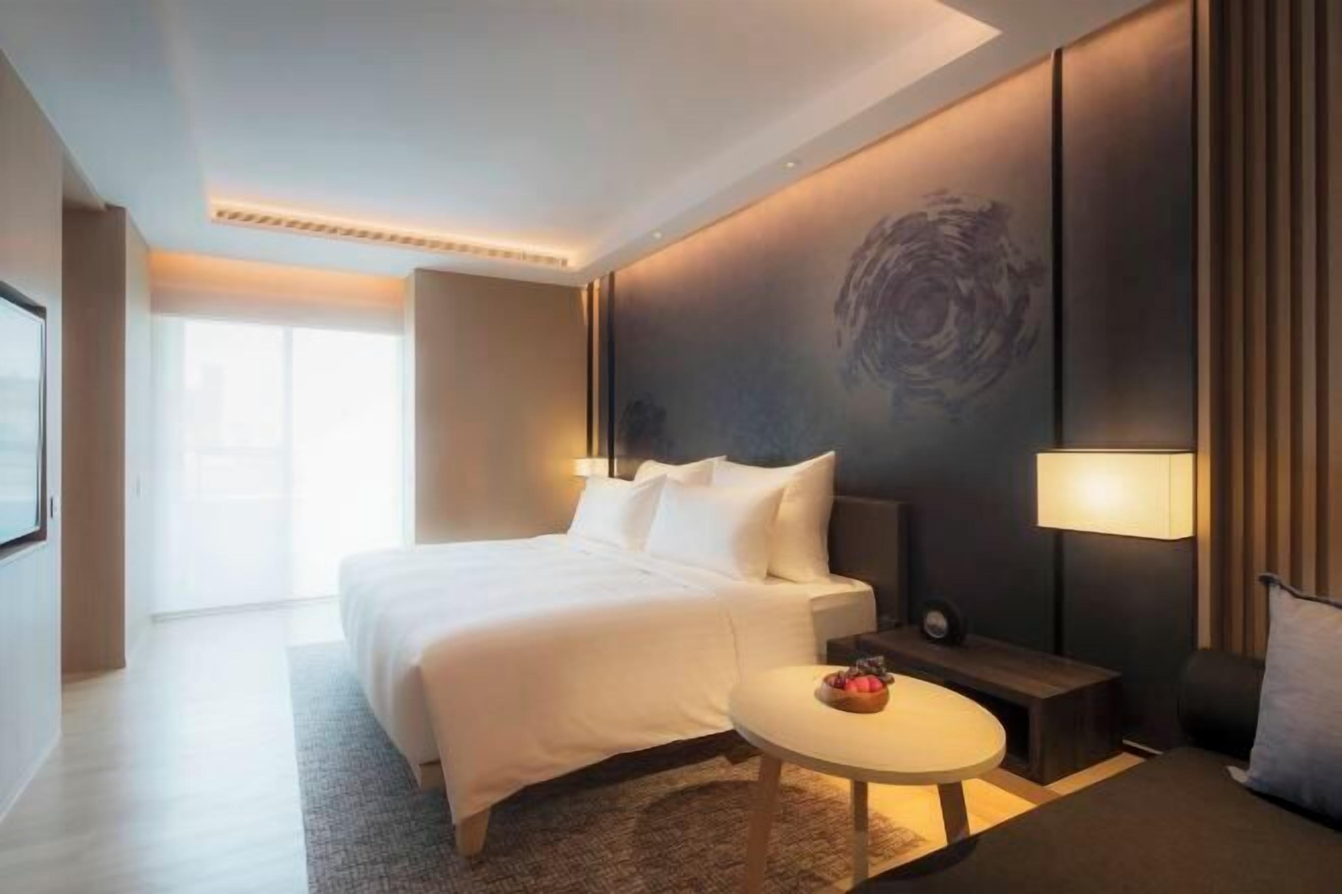 Premium bedding, free minibar, in-room safe, individually decorated