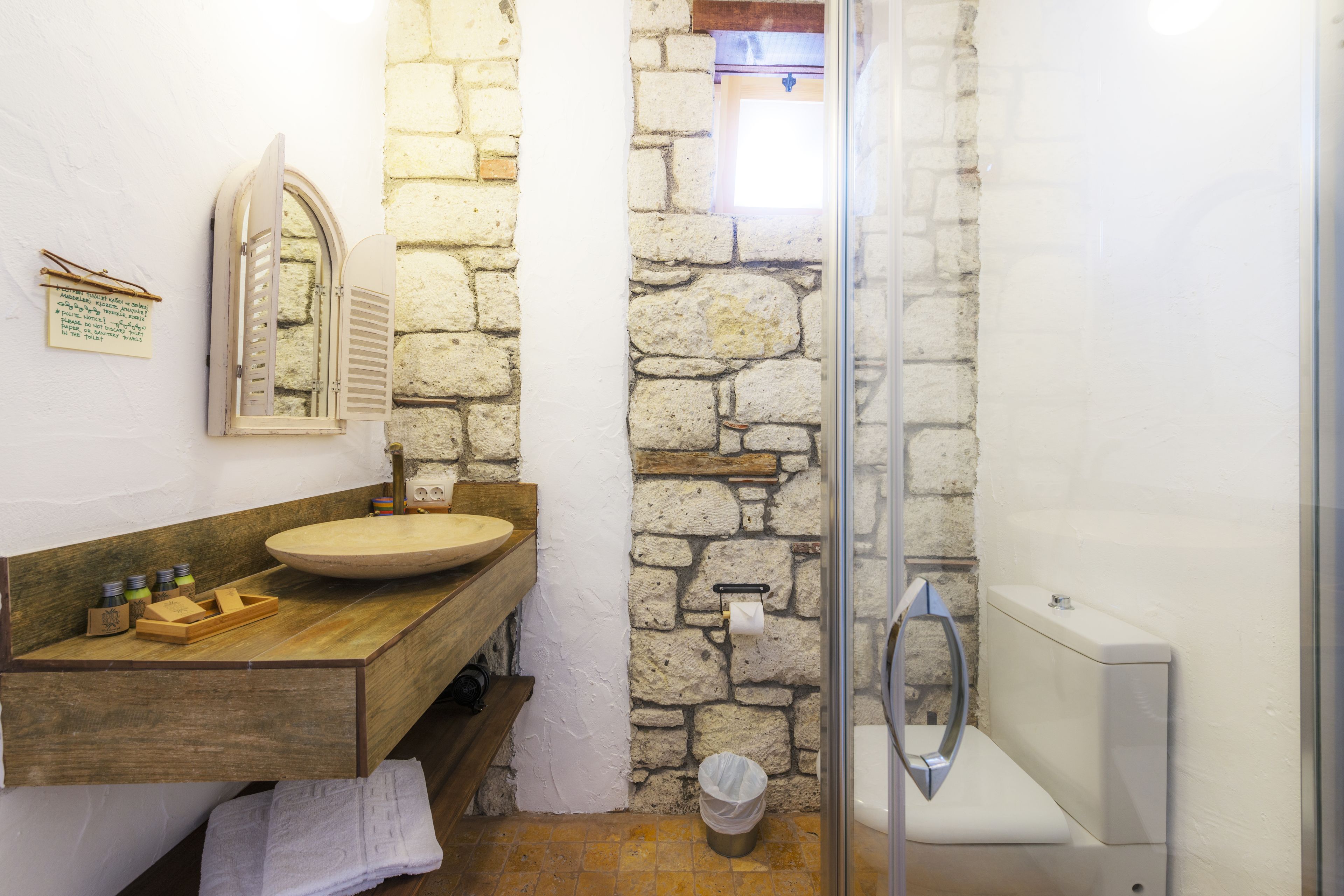 deluxe room | bathroom | shower, designer toiletries, hair dryer, slippers