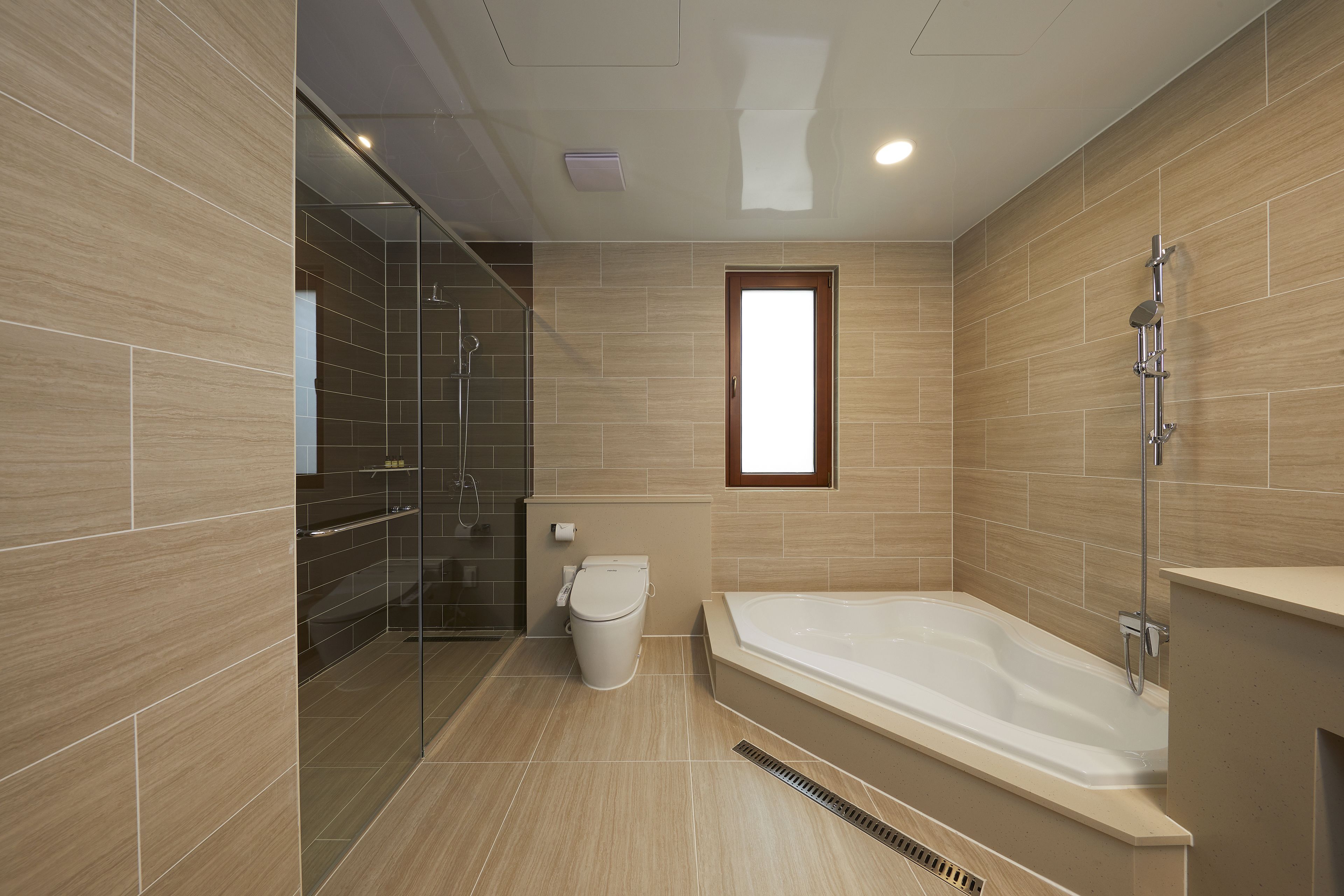 shower, designer toiletries, hair dryer, slippers