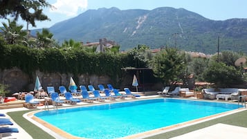 Outdoor pool, pool umbrellas, pool loungers