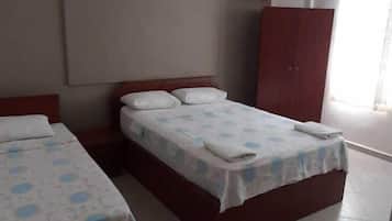 Triple Room | Minibar, iron/ironing board, free cots/infant beds, free WiFi