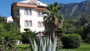 A multi-story building with a sign reading "EVEREST". - Everest Apart Hotel (Fethiye)