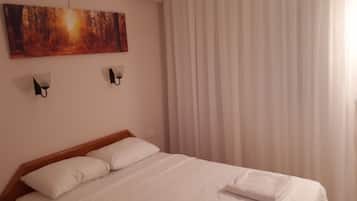 Apartment, 1 Bedroom | Minibar, iron/ironing board, free cots/infant beds, free WiFi