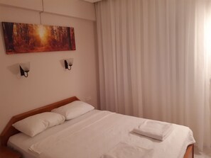 Apartemen, 1 kamar tidur | Minibar, setrika/meja setrika, dan tempat tidur bayi gratis