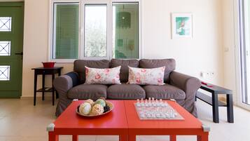 Villa Exclusive, 2 chambres, vue mer | Coin séjour | Télévision LCD, cheminée, lecteur de DVD