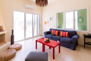 Premium Villa, 2 Bedrooms, Sea View | Living area | LCD TV, fireplace, DVD player - Athena Villas Olive Grove & Estate (Hersonissos)