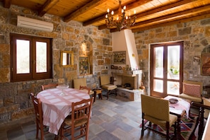 Traditional Stone Studio | Living area | LCD TV, fireplace, DVD player - Athena Villas Olive Grove & Estate (Hersonissos)