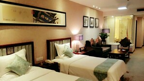 Deluxe Room | Ruang tamu | TV 