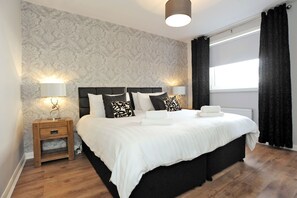1 habitación, tabla de planchar con plancha, wifi gratis y ropa de cama 