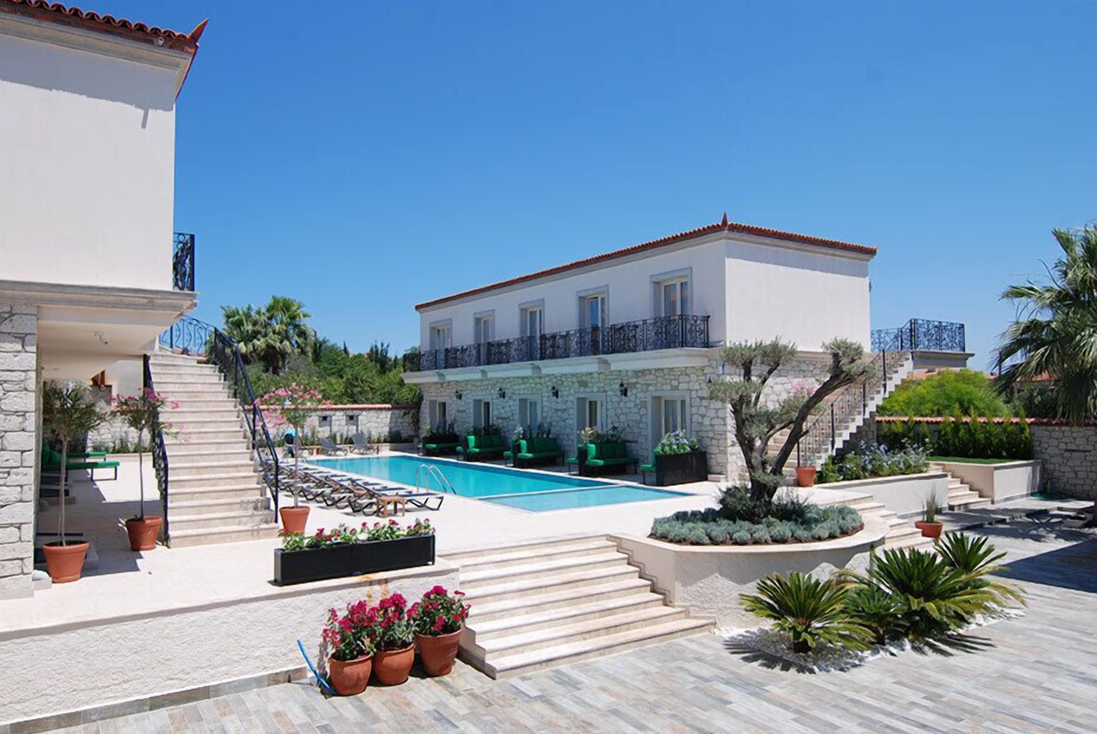 outdoor pool, pool umbrellas, pool loungers