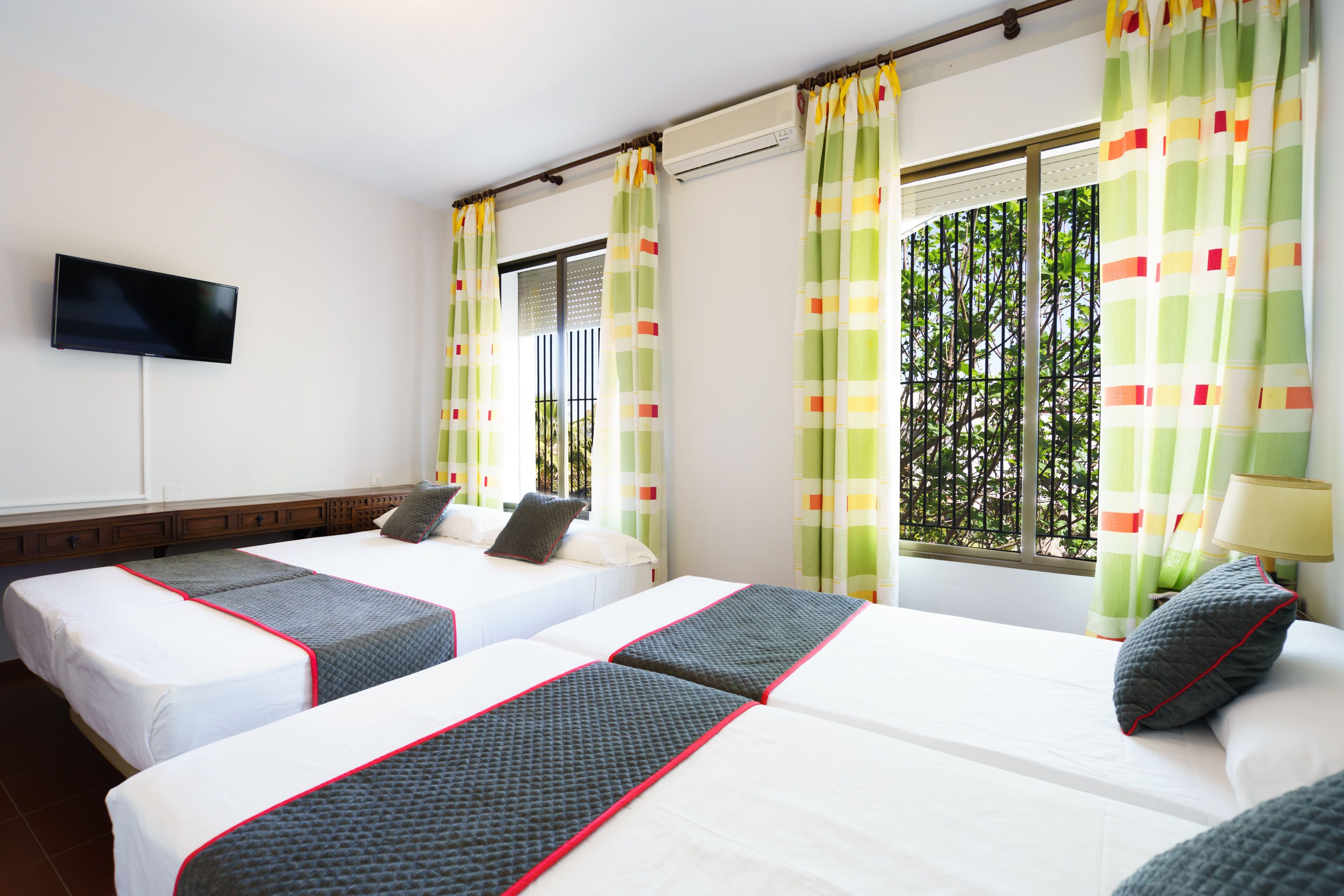 desk, blackout curtains, free wifi, bed sheets