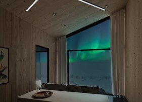 Aurora Suite with Sauna | Zona de estar | Televisión de pantalla plana de 50 pulgadas con canales digitales