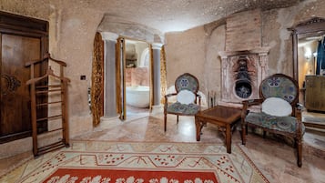 Deluxe Suite with Chimney | Living area | LCD TV, heated floors
