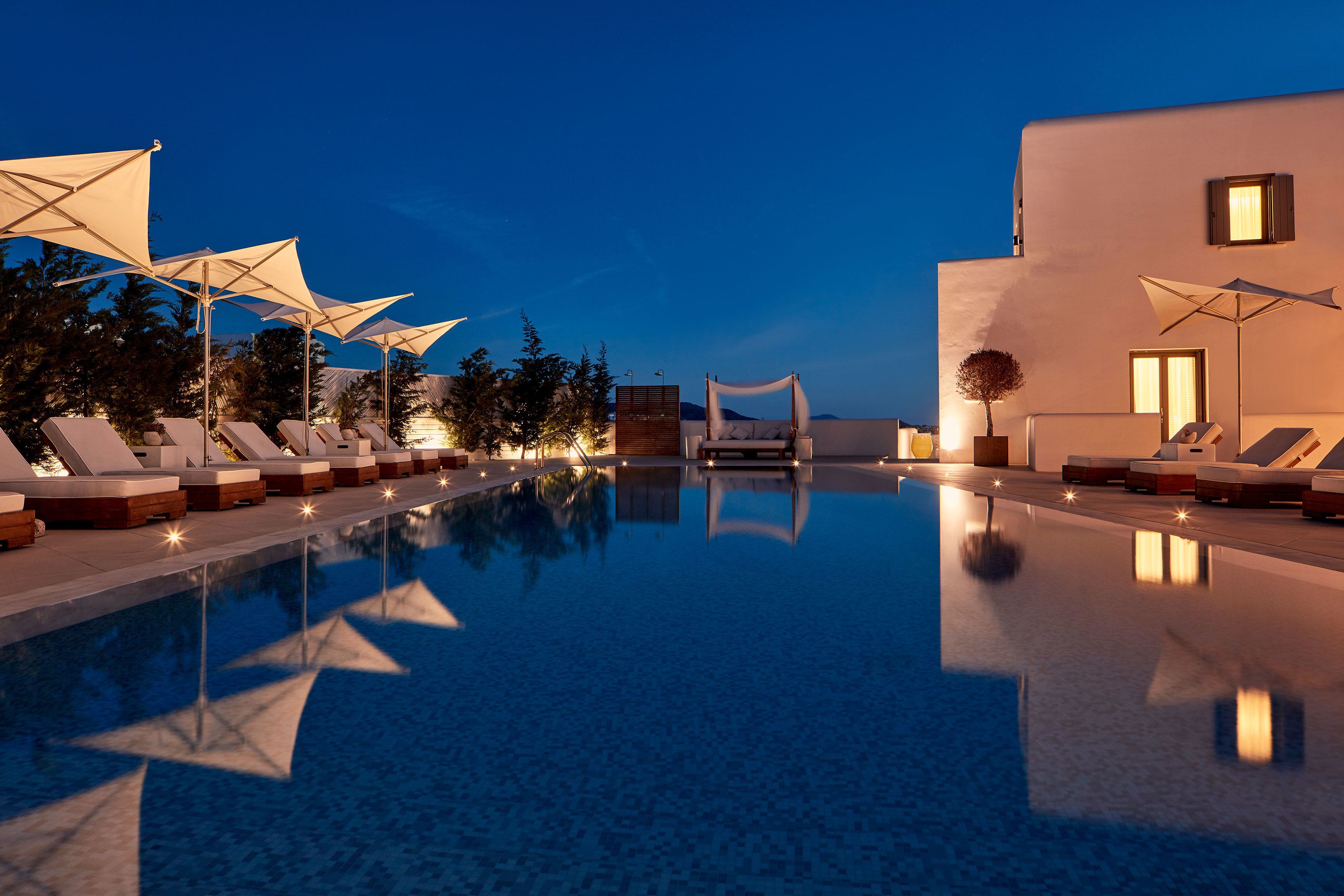 seasonal outdoor pool, pool umbrellas, pool loungers