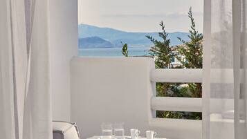 Premium Room, Partial Sea View | Minibar, in-room safe, desk, soundproofing