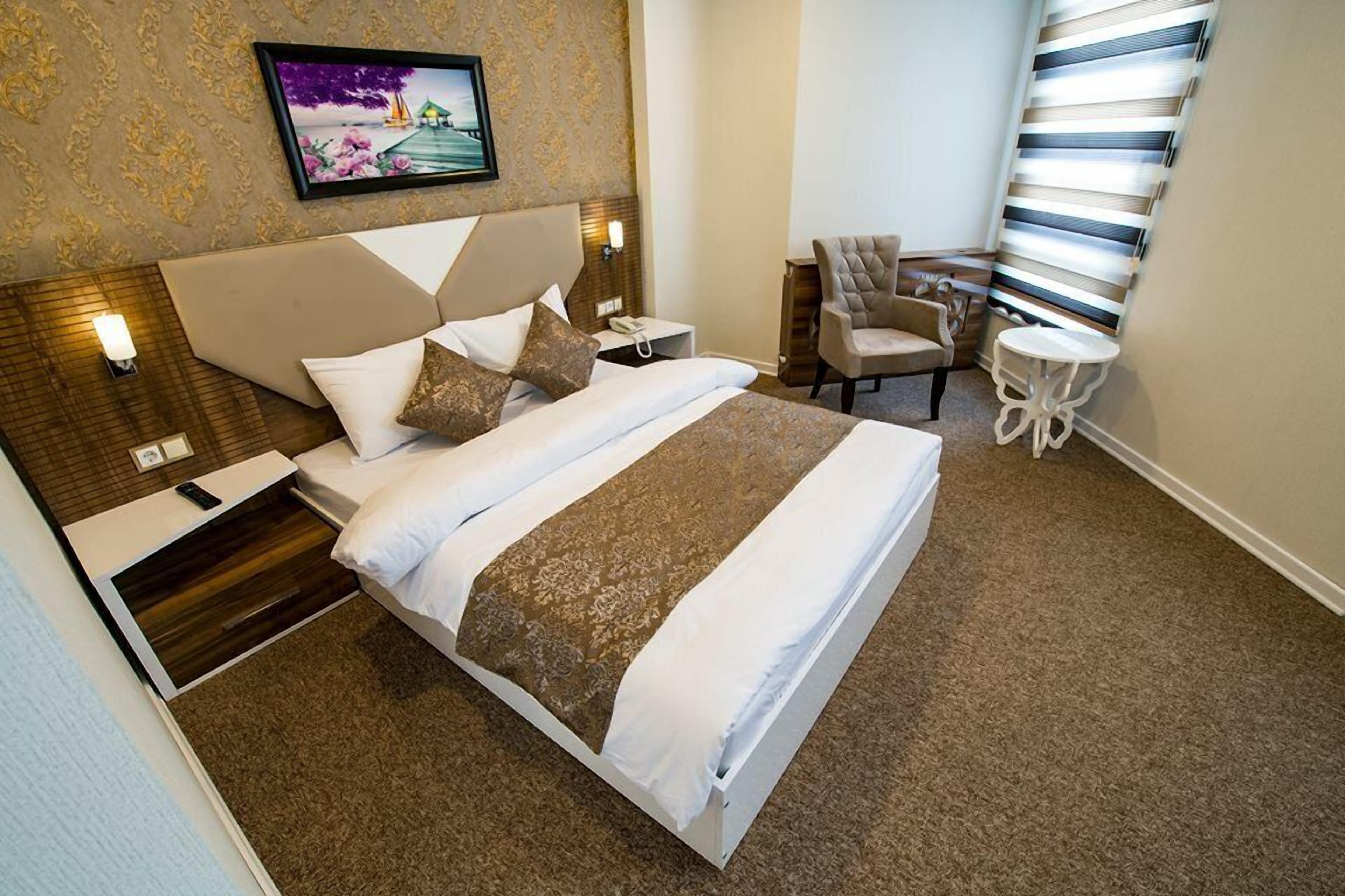 deluxe double room | premium bedding, in-room safe, desk, soundproofing