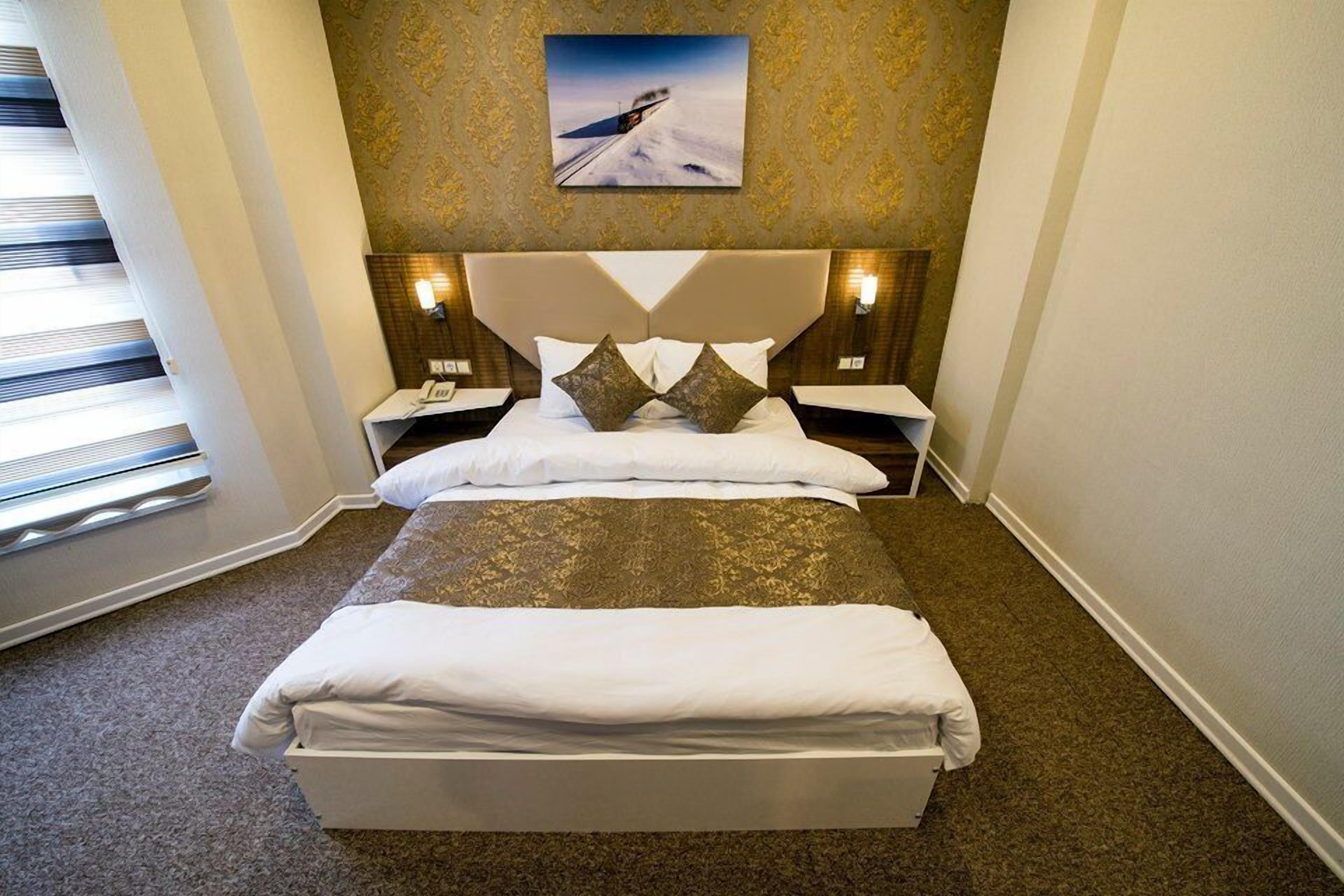 deluxe double room | premium bedding, in-room safe, desk, soundproofing