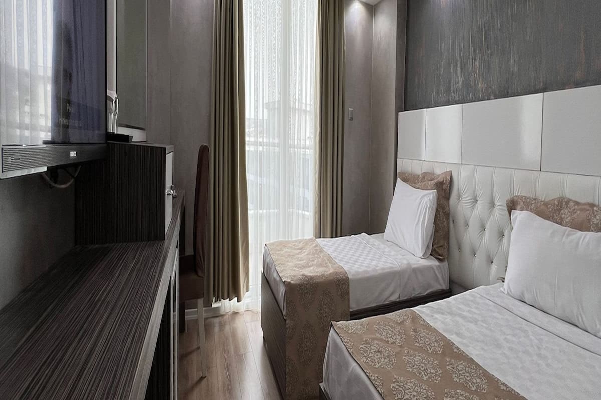 Minibar, caja fuerte, escritorio y espacio para trabajar con un portátil