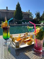 Indoor pool, outdoor pool, pool umbrellas, sun loungers