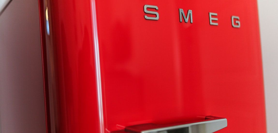 A red object with the letters "SMEG" visible.