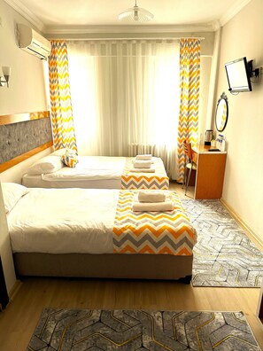 Standard Triple Room, Balcony | Minibar, in-room safe, desk, iron/ironing board - Hotel Kestanbol (Çanakkale)