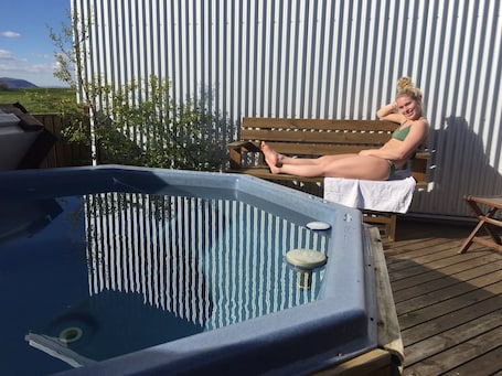 Outdoor spa tub. Lambastadir Guesthouse