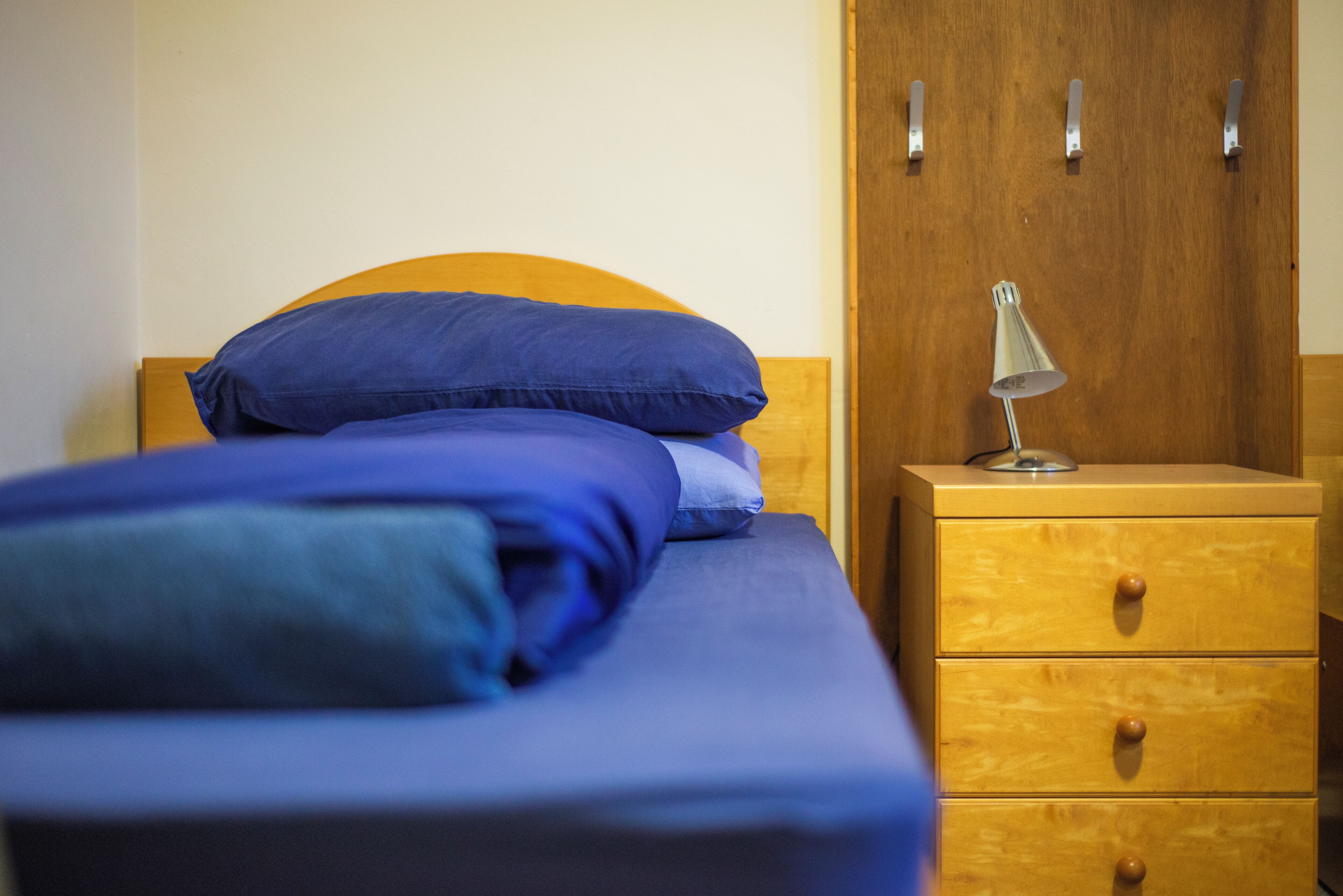 Eenpersoonskamer, gemeenschappelijke badkamer | Beddengoed