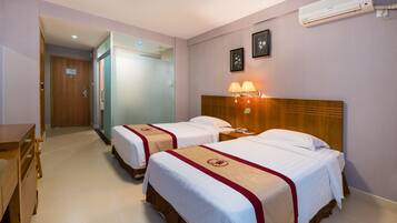 Desk, blackout drapes, rollaway beds, free WiFi