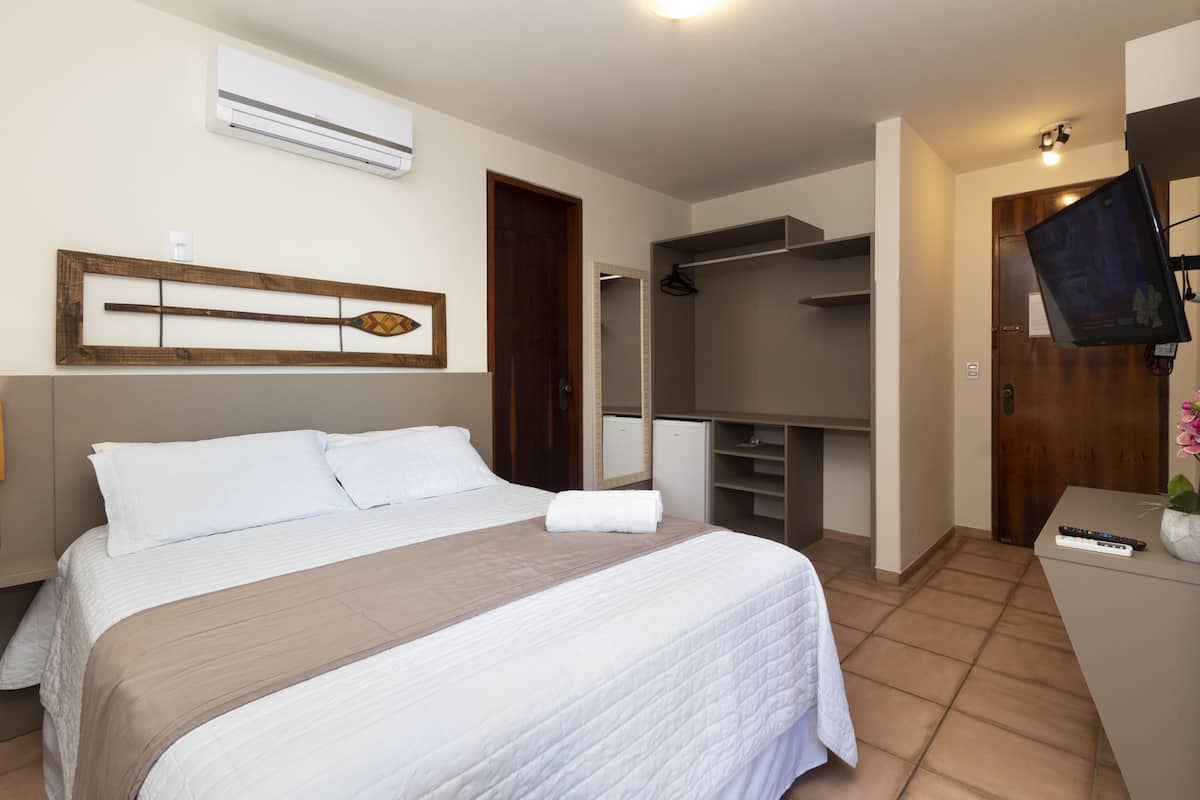 Suite Pakiri | Minibar, truy cập Internet không dây miễn phí, bộ trải giường