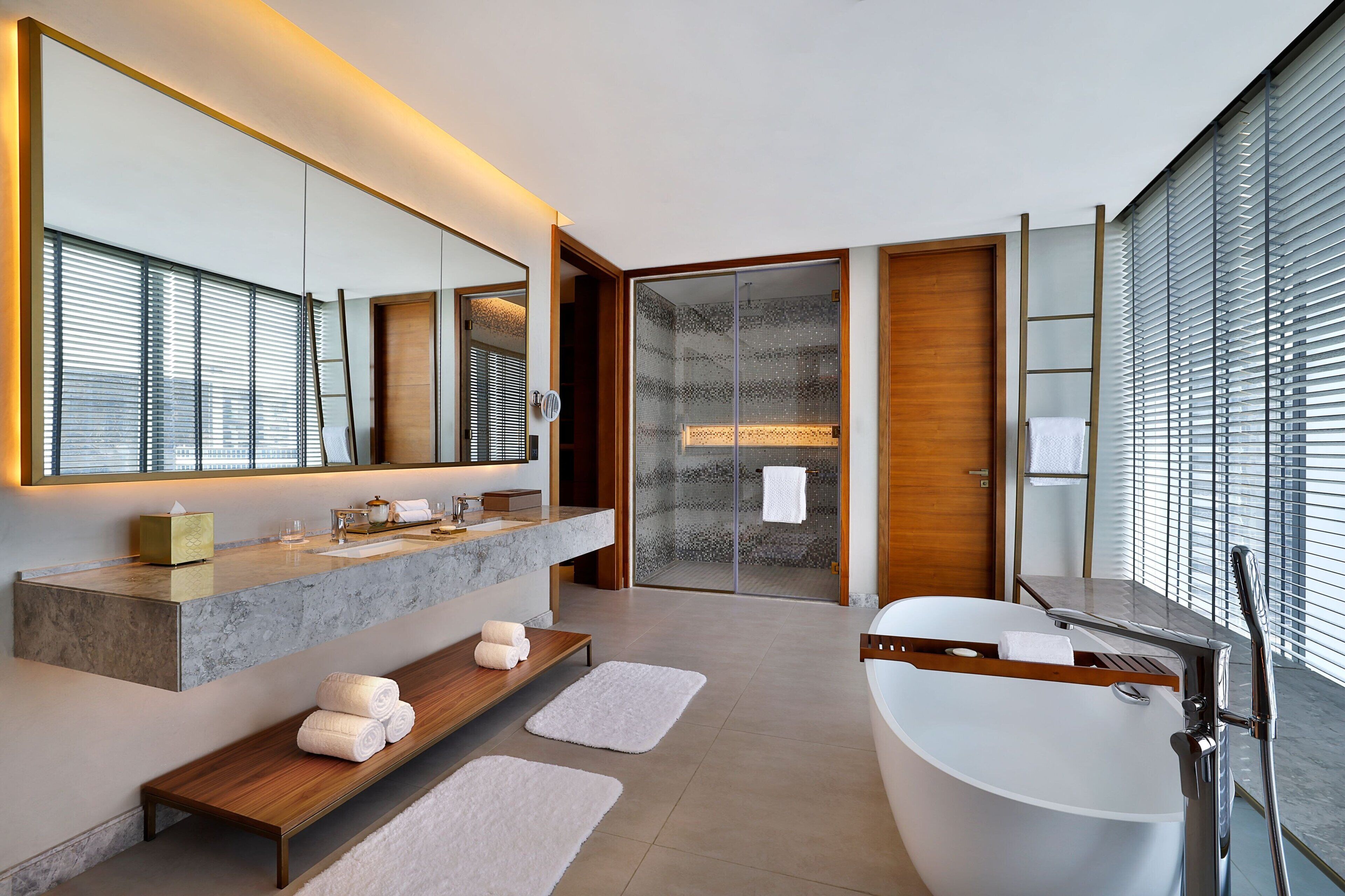 suite, 1 king bed, smoking, canal view | bathroom | separate bathtub and shower, deep-soaking bathtub, rainfall showerhead