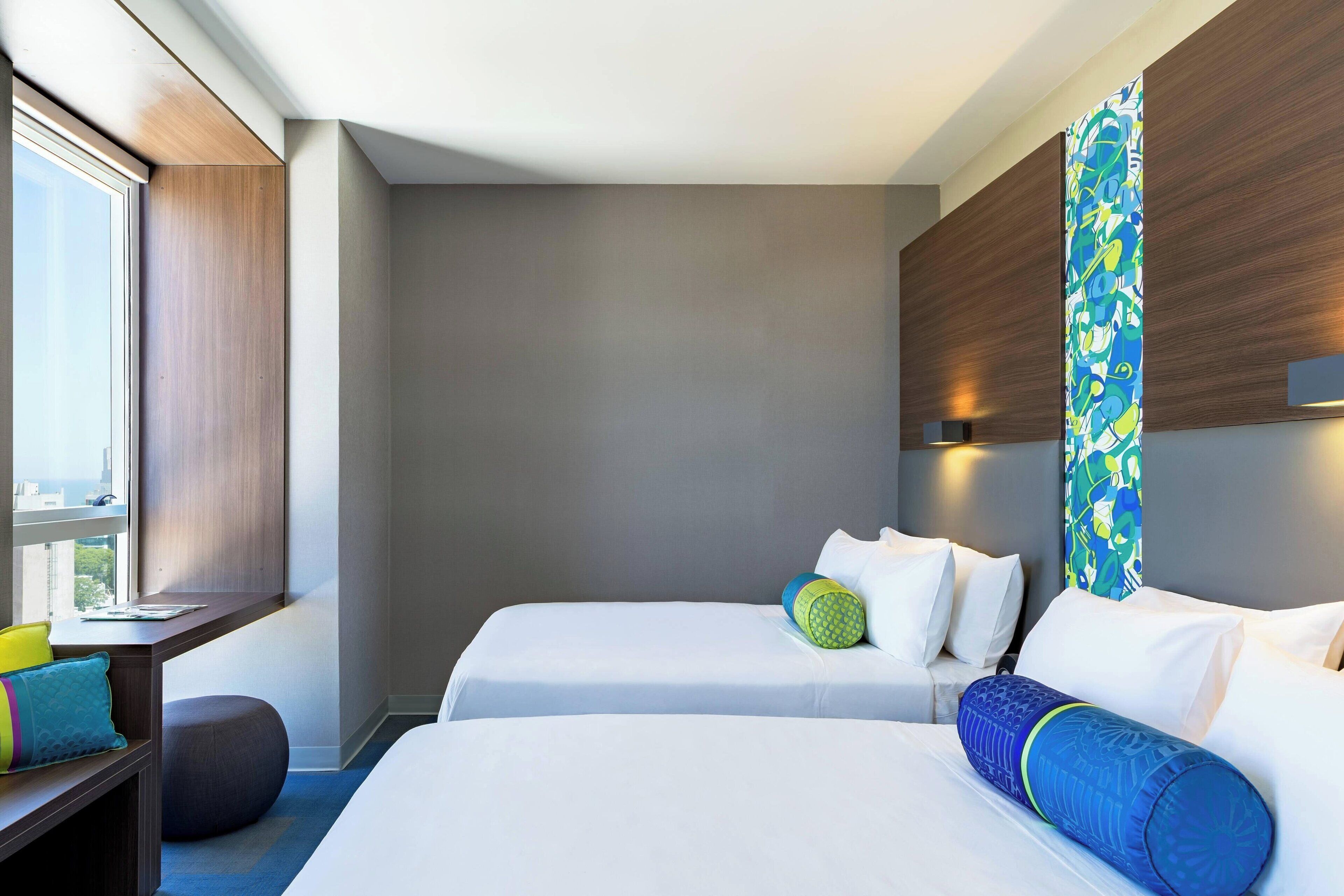 aloft, room, 2 queen beds, non smoking, city view | minibar, in-room safe, desk, blackout curtains