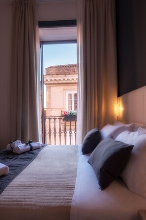 Suite exclusiva | Ropa de cama de alta calidad y minibar 