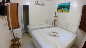 Habitación triple | Minibar, wifi gratis, ropa de cama