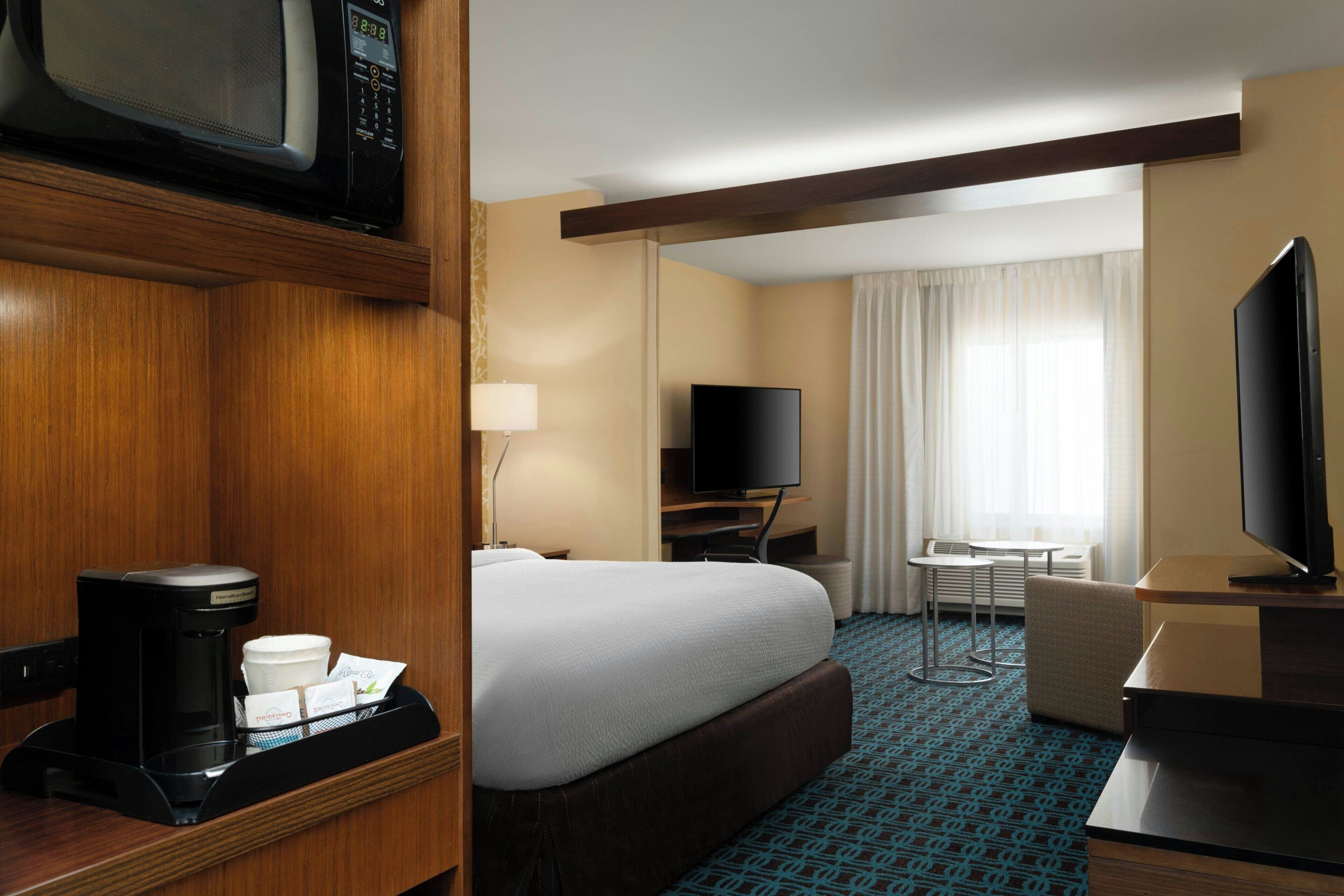 individually decorated, individually furnished, desk, blackout curtains