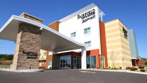 A Fairfield Inn & Suites Marriott hotel with a stone facade, large entrance, and clear signage. - Fairfield Inn & Suites by Marriott London (London)