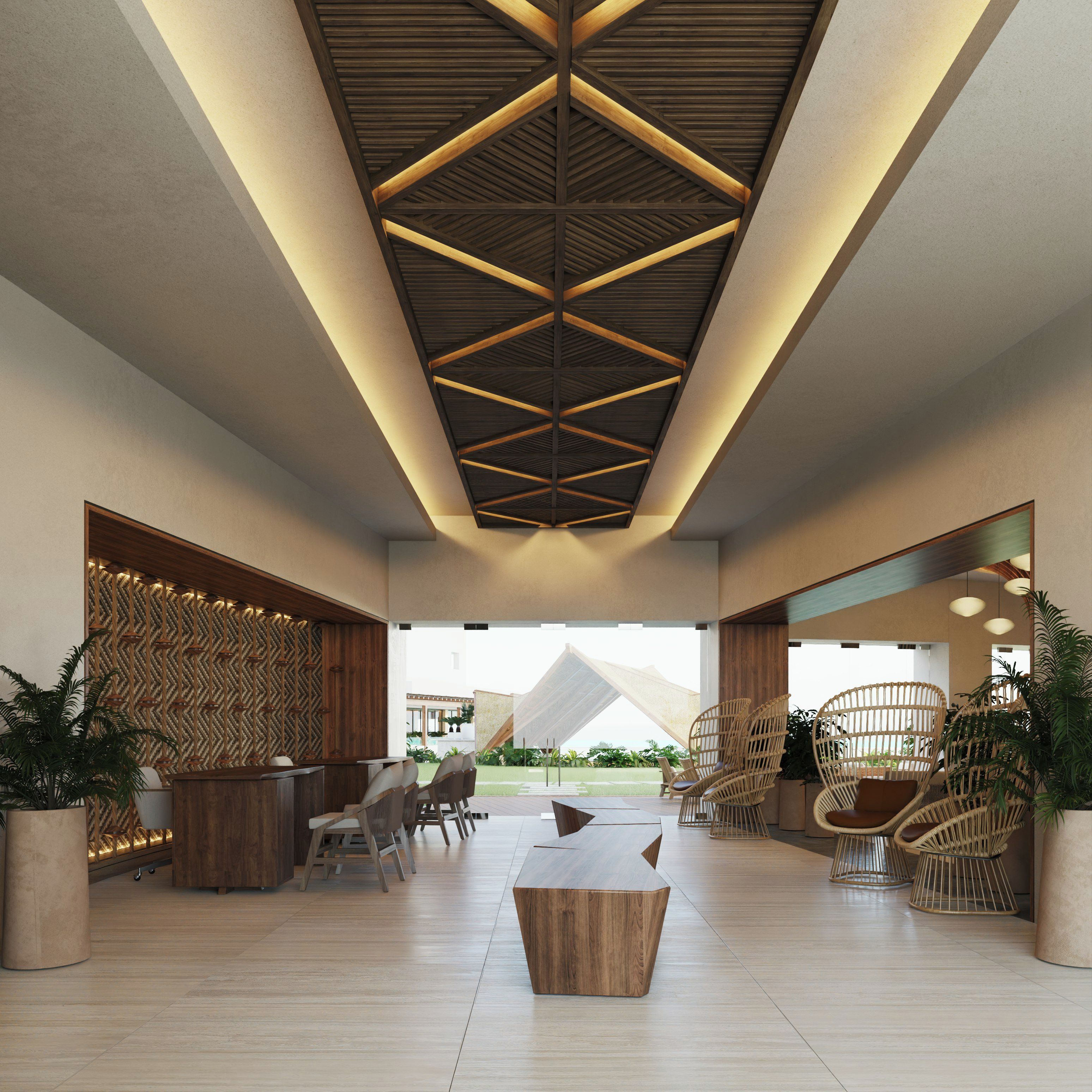 A spacious lobby with a high ceiling featuring a geometric wooden design, a reception desk, seating area, and a view of the outdoors.