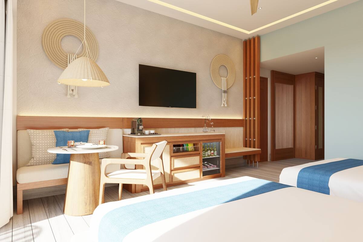 Habitación de lujo, 2 camas matrimoniales, vista al océano | Ropa de cama de alta calidad y caja de seguridad en la habitación