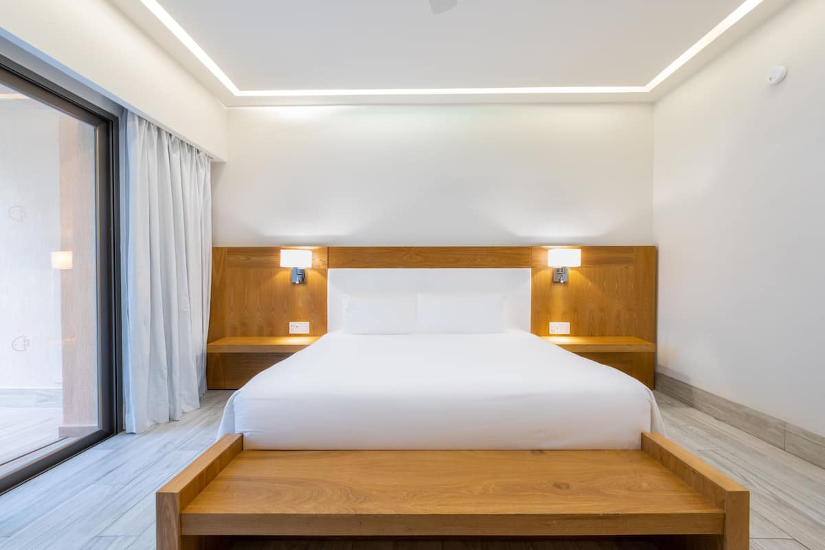 Habitación Deluxe, 1 cama King size, vista al océano | 1 habitación y ropa de cama de alta calidad